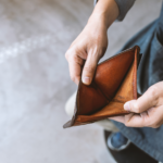 Man showing his empty wallet